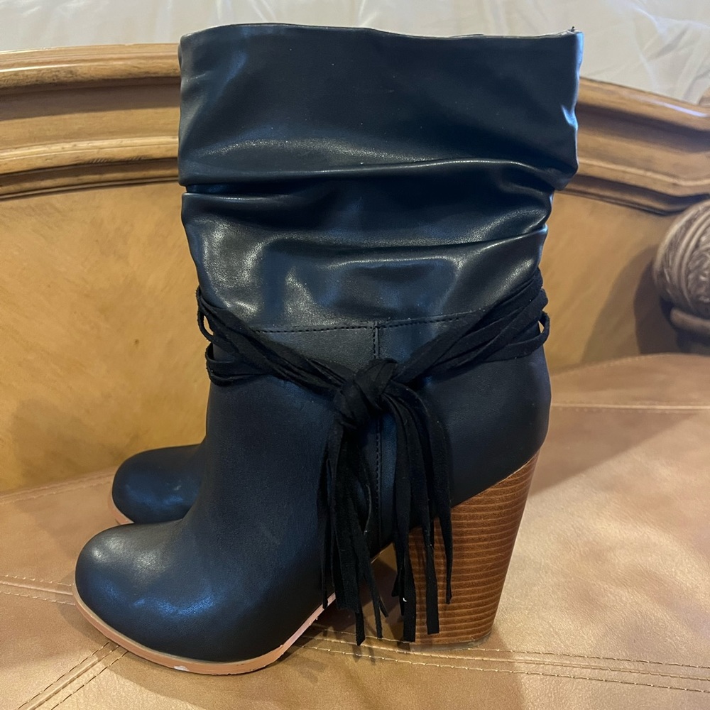 Black heeled boots. Size 10 Bebe